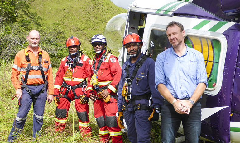 The team near the crash site: Allan (from left to right), Rudolf, Nicholas, Wesley and Capt. Cuo next to B212.
